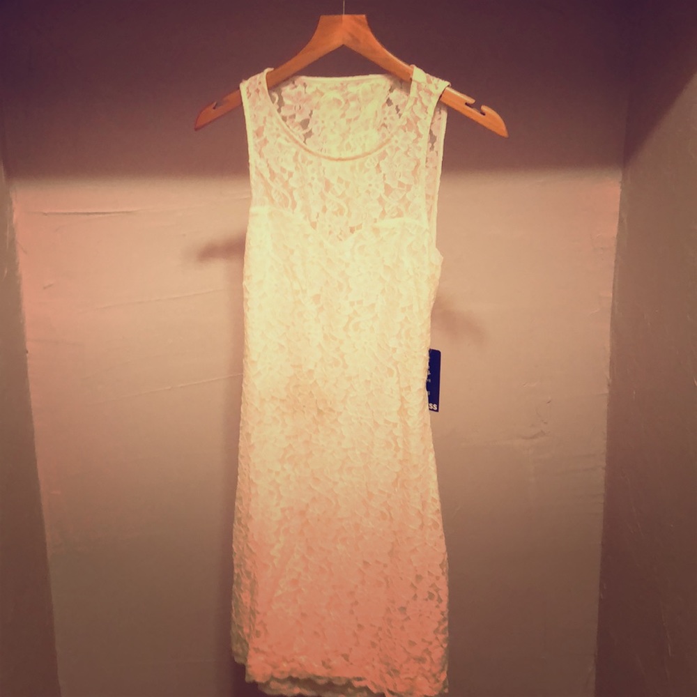 White lace, open back dress